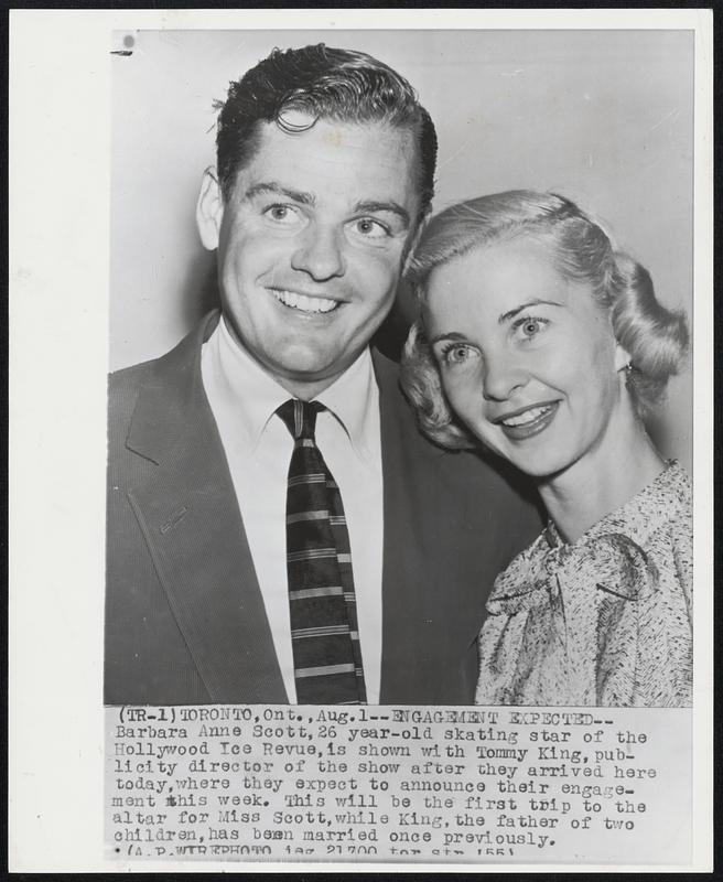 Engagement Expected -- Barbara Anne Scott, 26 year-old skating star of the Hollywood Ice Revue, is shown with Tommy King, publicity director of the show after they arrived here today, where they expect to announce their engagement this week. This will be the first trip to the altar for Miss Scott, while King, the father of two children, has been married once previously.