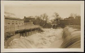 Main Street bridge being destroyed by flood waters