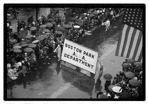 Boston Park Department sign in a rainy parade