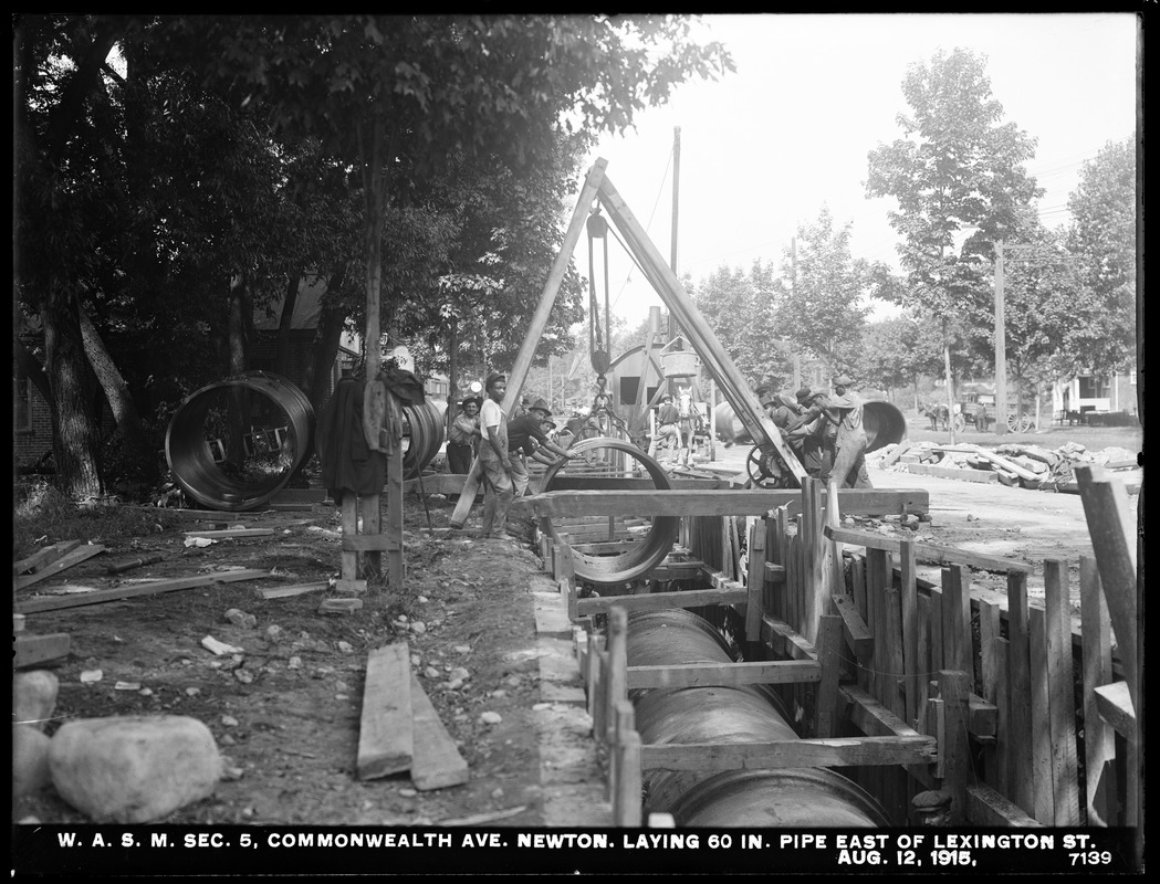 Distribution Department, Weston Aqueduct Supply Mains, Section 5, laying 60-inch pipe in Commonwealth Avenue east of Lexington Street, Newton, Mass., Aug. 12, 1915