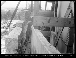 Distribution Department, Southern Extra High Service Bellevue Reservoir, granite masonry ready for concrete backing, masonry tower, Bellevue Hill, West Roxbury, Mass., Aug. 16, 1915
