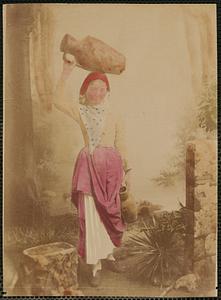 Studio portrait of woman holding pitchers