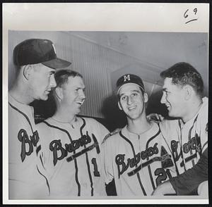 Power Players Beat Redlegs-Joe Adcock, left, former Cincinnati first baseman, blew in the faces of his former teammates last night when he walloped two homers, one a grand slammer, to lead the Braves to a 9-2 win at Cincinnati. Also hitting homers were Del Crandall, second left, and Johnny Logan, right. Warren Spahn, second from right, pitched his third straight victory of the season.