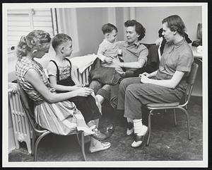 Fort Banks Service Club. Mrs Ruth Vollmar. Kenneth - 4. Mrs John T Couch. Jeffrey 14 Months. Mrs Richard Casselman. All of 221 Shore Drive. Weather Storms Nov. 6-7, 1953