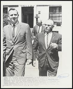 Defendants in Klan Suit--three defendants named in a Justice Department suit seeking to enjoin the Ku Klux Klan at Bogalusa leave Federal court where the case got underway today in New Orleans. From left are Dewey Smith, Charles Christmas (background) and Saxon Farmer. The court gave Farmer 48 hours to bring records to the court pertaining to a number of organizations including the Klan.