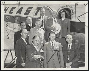 Make Aerial Inspection-Gov. Tobin and members of the executive council just before they took off from East Boston in a Northeast Airlines plane for an inspection of airports. Front: President Paul F. Collins of NEA, Gov. Tobin and Councilor Clayton L. Havey. Center group: Councillors James J. Marshall, Carl A. Sheridan and John J. Sawtelle with Sterwardess Mary Kelly. Rear: Secretary John H. Louden with Councillors Joseph P. Clark, Jr., and Robert V. O'Sullivan.