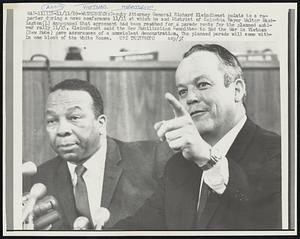 Deputy Attorney General Richard Kleindienst points to a reporter during a news conference 11/11 at which he and District of Columbia Mayor Walter Washington (L) announced that agreement had been reached for a parade route for the planned anti-war rally 11/15. Kleindienst said the New Mobilization Committee to End the War in Vietnam (New Mobe) gave assurances of a nonviolent demonstration. The planned parade will come within one block of the White House.