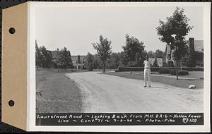 Contract No. 71, WPA Sewer Construction, Holden, Laurelwood Road, looking back from manhole 2A-6, Holden Sewer Line, Holden, Mass., Jul. 9, 1940
