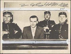 Guy A. Davin, charged with murder of Richard Wall, American