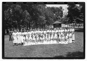 Group holding circular emblems