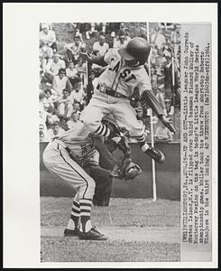 Up and Out--Little Leaguer John Currado Staten Island, N.Y. is flipped over third baseman Richard Moller of Monterrey Mexico on the tag in today’s Little League World Series championship game. Moller took the throw from shortstop Roberto Hinojosa in the third inning.