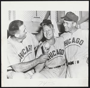 Happy Cub Stars celebrate Pitcher Warren Hacker’s one-hit, 2-1 victory over Braves at Milwaukee. Left to right, Catcher Harry Chiti, Hacker and First Baseman Dee Fondy, who collected homer and double. Lone Brave hit was George Crowe’s pinch homer with one out in ninth.