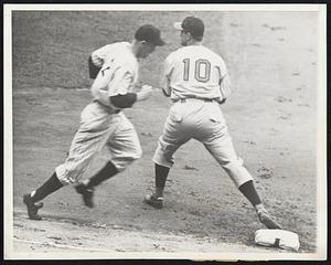 Rolfe out at first -- Red Rolfe, Yankee third baseman, raced to first in vain in this first-inning action in the World Series opener Oct. 4. Rolfe had bounced a grounder to Frey at second and was thrown out at first, McCormick getting the put out