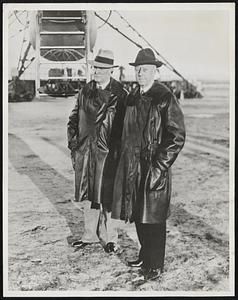 They Ride on Akron. Admiral Moffett and Secretary of the Navy Adams (Right) Photographed at Lakehurst, N.J., April 29 a Short Time After They Had Been Among the Passengers on a Night Test Flight of the US.S. Akron, Giant Dirigible. The Trip Was Pronounced Successful.