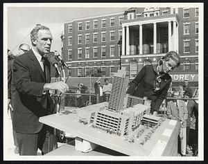 Mayor and Mrs. Kevin H. White display model of city hospital addition.