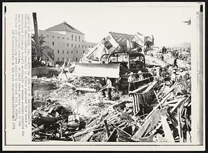 Hospital Hard Hit by Earthquake -- The Veterans Administration Hospital in Sylmar presented this scene of devastation following today's earthquake as rescue workers searched the ruins for additional victims. At least seven persons died at the hospital and authorities were unable to account for 54 others.