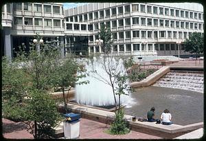 People sitting by fountain, Boston City Hall Plaza