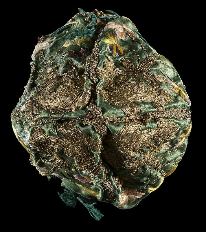 17th-century embroidered silk purse stabilized with fragments of medieval manuscript waste