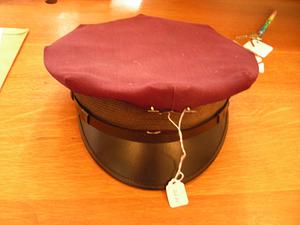 Maroon hat with black brim