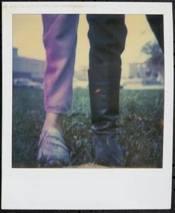 Close-up of two legs