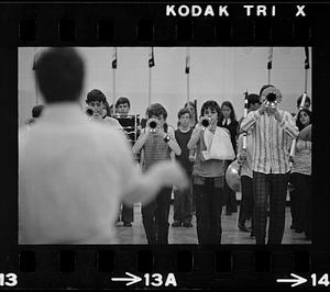 Drum-and-bugle practice in high school gym, Lynnfield