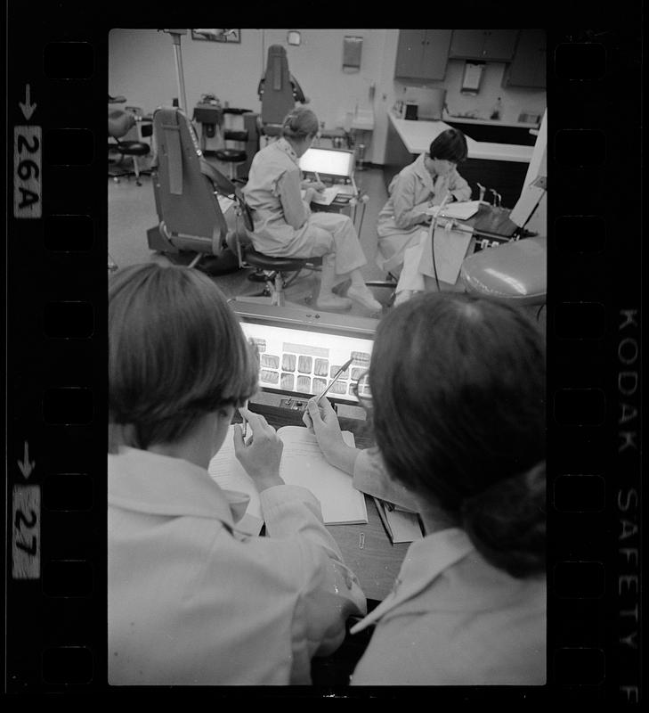 Dental students evaluate x-rays, Boston