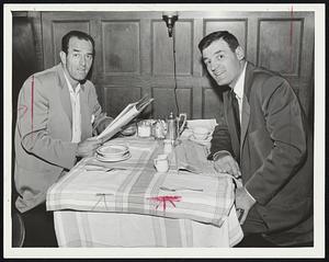 Checking up on the Latest News before last night's game with the Red Sox are a pair of Chicago White Sox stars, Jim Rivera, left, and Walt Dropo, outfielder and first baseman, respectively.