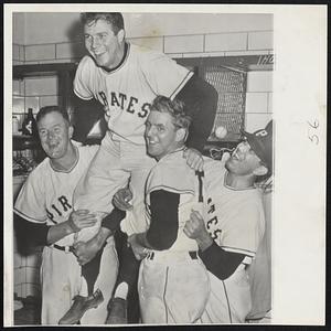 No Friend to Brooklyn is pitcher Bob Friend of the Pirates, here being given a ride aboard the shoulders of teammates Red Munger, left, and Frank Thomas. On the right, Manager Bob Bragan smiles happily. Friend beat the Dodgers last night, 6-5, and Thomas drove in the winning run in addition to hitting a home run.