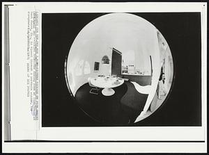 Dining Room – The dining room of foam house at West Point, Ga., is viewed a porthole window.