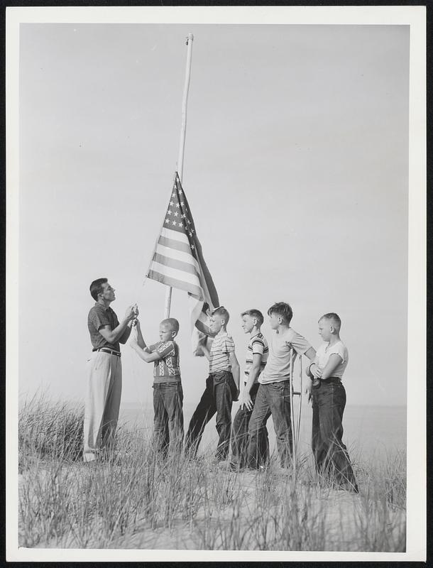 Plum Island - Infantile Paralysis Raising the flag. L to R Jack Reardon - counselor, Brian Curry - 11 - Lynnfield, Peter Pickett - 12 - Salem, Donnie Mattson - 13 - Quincy, Paul Leary - 14 - Cambridge, Stuart Balser - 12 - Saugus