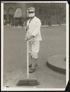 Sarga Nt White Wings Doing his Duty. Photo shows one of the street cleaners of Chicago working with gaus mask to keep the influenza germs lodging in his nostrils.