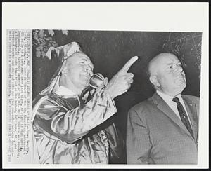 Klan Wizard Speaks at Rally--James Venable, left, Atlanta, Ga., Imperial Wizard of the Klu Klux Klan, addressed a KKK rally at a farm near here last night. At right is Hugh Morris, Buchanan, Ga., National Emperor of the KKK. While Venable was speaking, a 19-year-old youth identified as Dan Wagner, Baltimore, Md., was arrested nearby and charged with carrying concealed weapons (an automatic pistol in a shoulder holster).