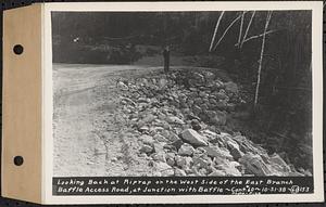 Contract No. 60, Access Roads to Shaft 12, Quabbin Aqueduct, Hardwick and Greenwich, looking back at riprap on the west side of the East Branch Baffle access road, at junction with Baffle, Greenwich and Hardwick, Mass., Oct. 31, 1938