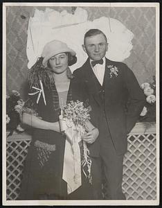 Earl Sande and Wife. Earl Sande, and his wife. Earl Sande is to ride Zev. who is America's representative in the $100,000 international race against the best horse and rider Keystone View Company.