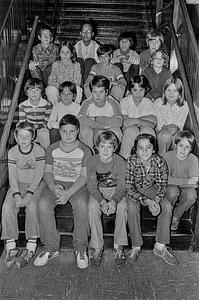 Kids sitting on stairs