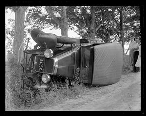 Overturned car on its side