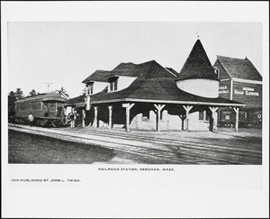 Railroad station, Needham Square, with Needham grain elevator and a train