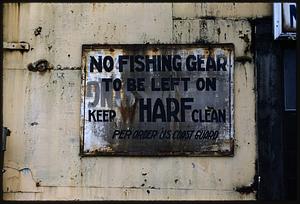Sign reading "No fishing gear to be left on wharf," T Wharf, Boston