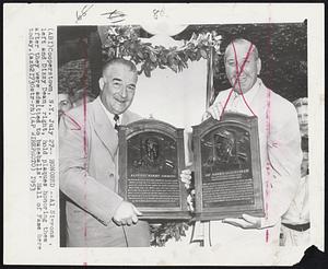 Honored--Al Simmons, left and Dizzy Dean, right, hold plaques honoring them after they were admitted to baseballs' Hall of Fame here today.