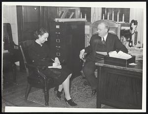 Mayor Mansfield dictating to his stenographer, Miss Mary L. Thompson. Mayor Box Mansfield - Groups Jan.-July 1937