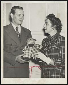 Rummage Sale Gift-Gov. Tobin presents a rag doll to Mrs. Thomas A. Fitzgerald, general chairman, Women’s Committee of the Crosscup-Pishon American Legion Post, which will sponsor a rummage sale in Horticultural Hall May 22. Proceeds of the sale will be used to give summer vacations to underprivileged children.