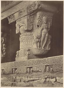 One of front pillars from Ramesvara [Close view of pillar at entrance to Hindu Cave XXI (Ramesvara), Ellora]