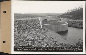 Contract No. 66, Regulating Dams, Middle Branch (New Salem), and East Branch of the Swift River, Hardwick and Petersham (formerly Dana), looking westerly at dam and bridge, east branch regulating dam, Hardwick, Mass., Nov. 10, 1939