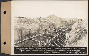 Contract No. 80, High Level Distribution Reservoir, Weston, looking west from Sta. 889+10+/- showing aqueduct construction, high level distribution reservoir, Weston, Mass., Mar. 13, 1940