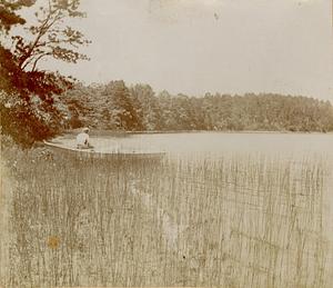 Man in boat on Long Pond, South Yarmouth, Mass.