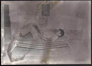 Boy lying down and reading