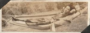 Unidentified woman lying in hammock