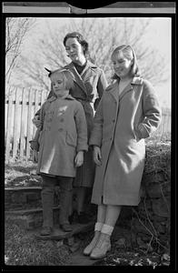 Two women and one child outdoors