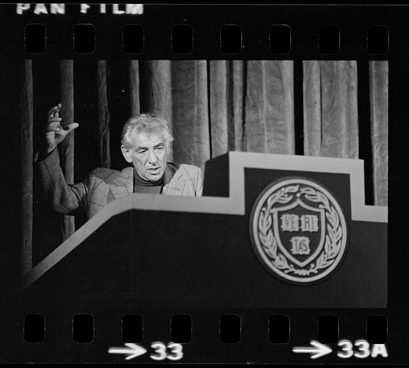 Leonard Bernstein rehearses a speech at Harvard's Sanders Theatre, Cambridge