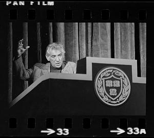 Leonard Bernstein rehearses a speech at Harvard's Sanders Theatre, Cambridge